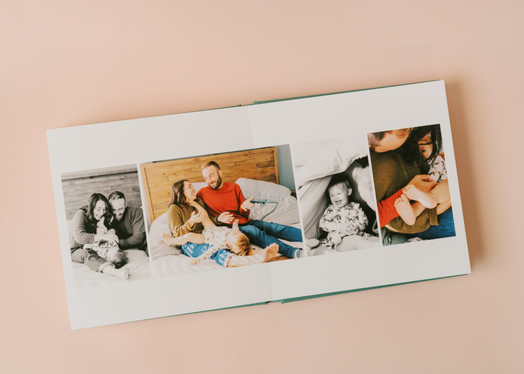 A photo album with pictures of a young toddler