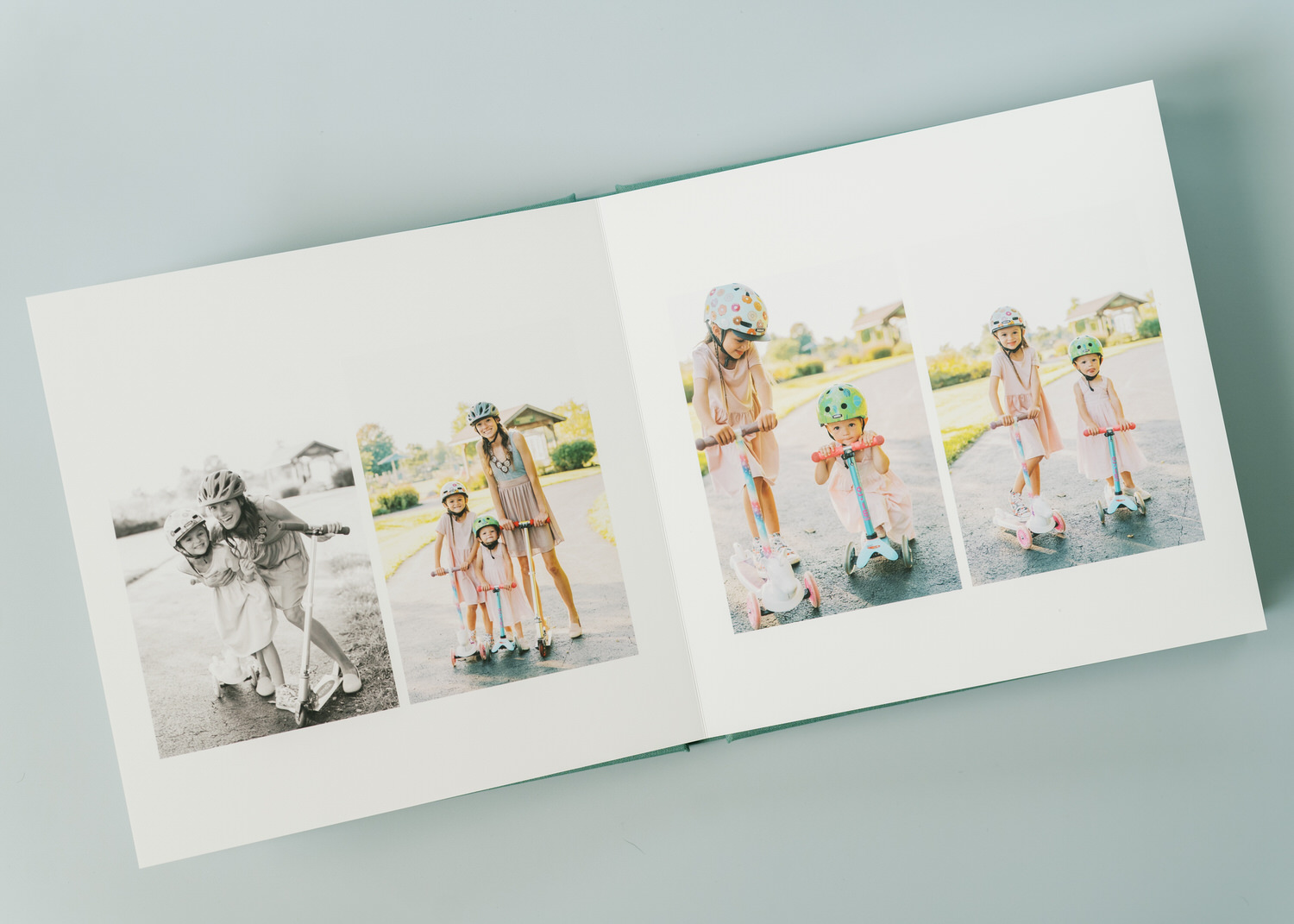 A photo album that shows pictures of two sisters riding scooters