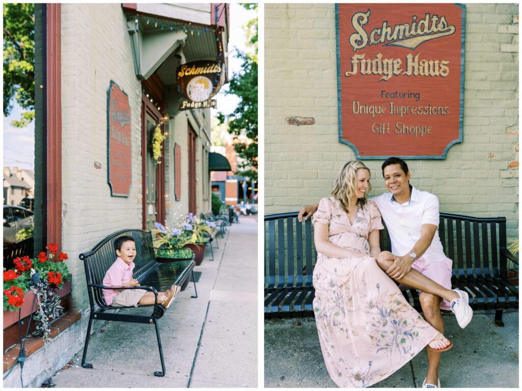 A family of three sitting on an iron bench in front of Schmidt's sausage house in German Village